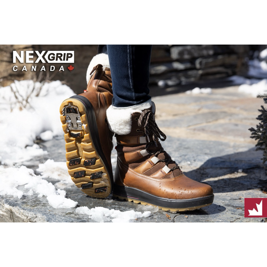 A person wearing brown winter boots with white faux-fur trim stands outdoors on a stone surface with snow in the background. The boot sole is turned to show the tread, and the NEXGRIP CANADA logo appears in the top left.