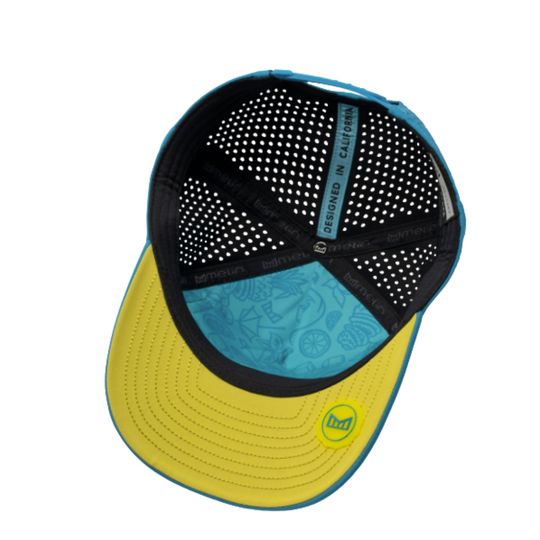A close-up of a trucker-style cap's back and brim, featuring a bright yellow brim with a lime green circular logo, a black mesh back, and a light blue inner crown and side panel.