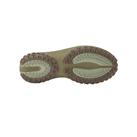 The outsole of a hiking shoe in a muted olive green and brown colorway, showing the tread pattern and brand name 'UYN' on the heel.
