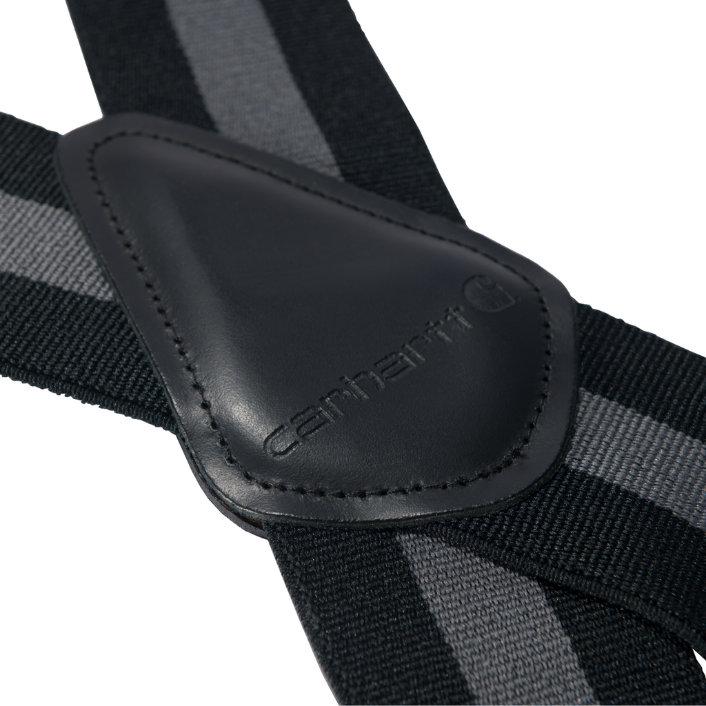 Close-up of a black and gray striped suspenders with a Carhartt logo on a white background