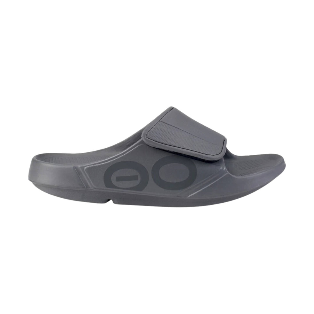 Gray slide sandal with a wide adjustable top strap and molded footbed