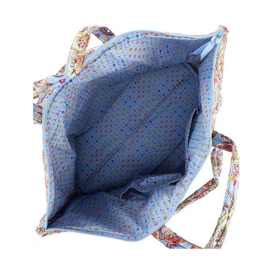 Open blue patterned tote bag with long printed straps and zippered top