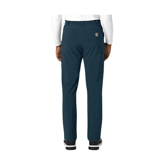 Dark blue straight-leg scrub pants shown from the back with an elastic waistband and cargo pockets