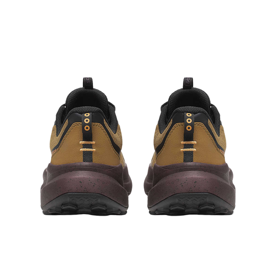 Pair of brown and black shoes on a white background