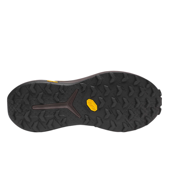 Black shoe sole with tread pattern and a yellow logo on a white background