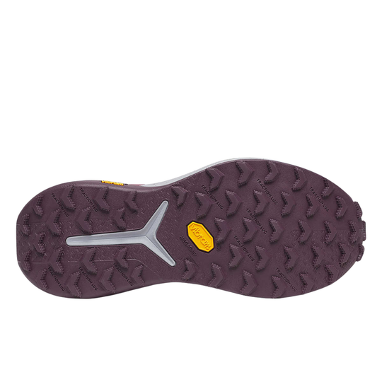 Close-up of a shoe sole with tread pattern and brand logo on a white background