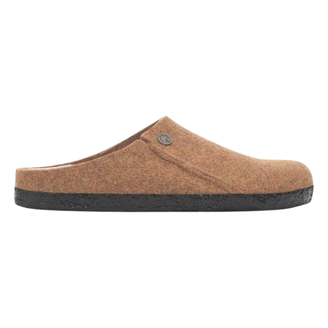 Brown slipper with a black sole on a white background