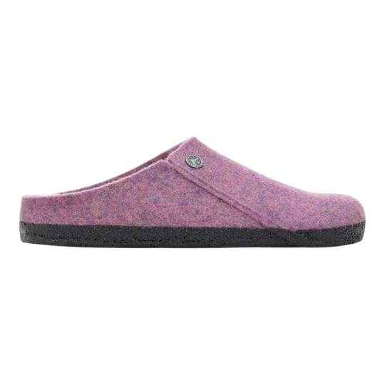 Purple slipper with a black sole on a white background