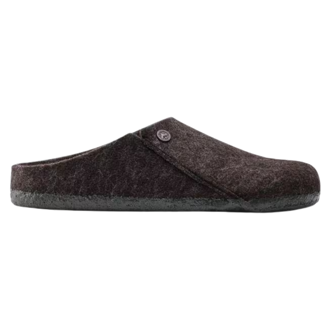 Brown felted slipper on a white background