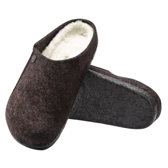 Pair of brown slippers with white interior on a white background