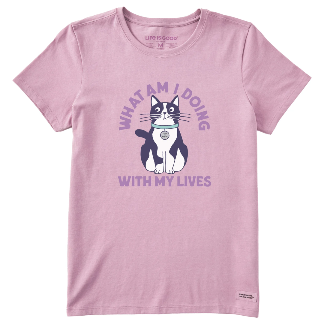 Pink t-shirt with a cat graphic and text on a white background