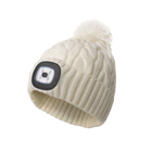 white knit beanie with a LED light on a white background