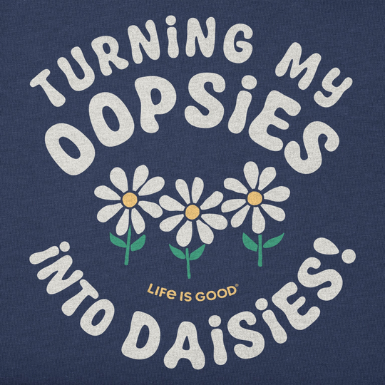 Dark blue T-shirt graphic with curved white text and three daisies, plus small 'Life is Good' text.