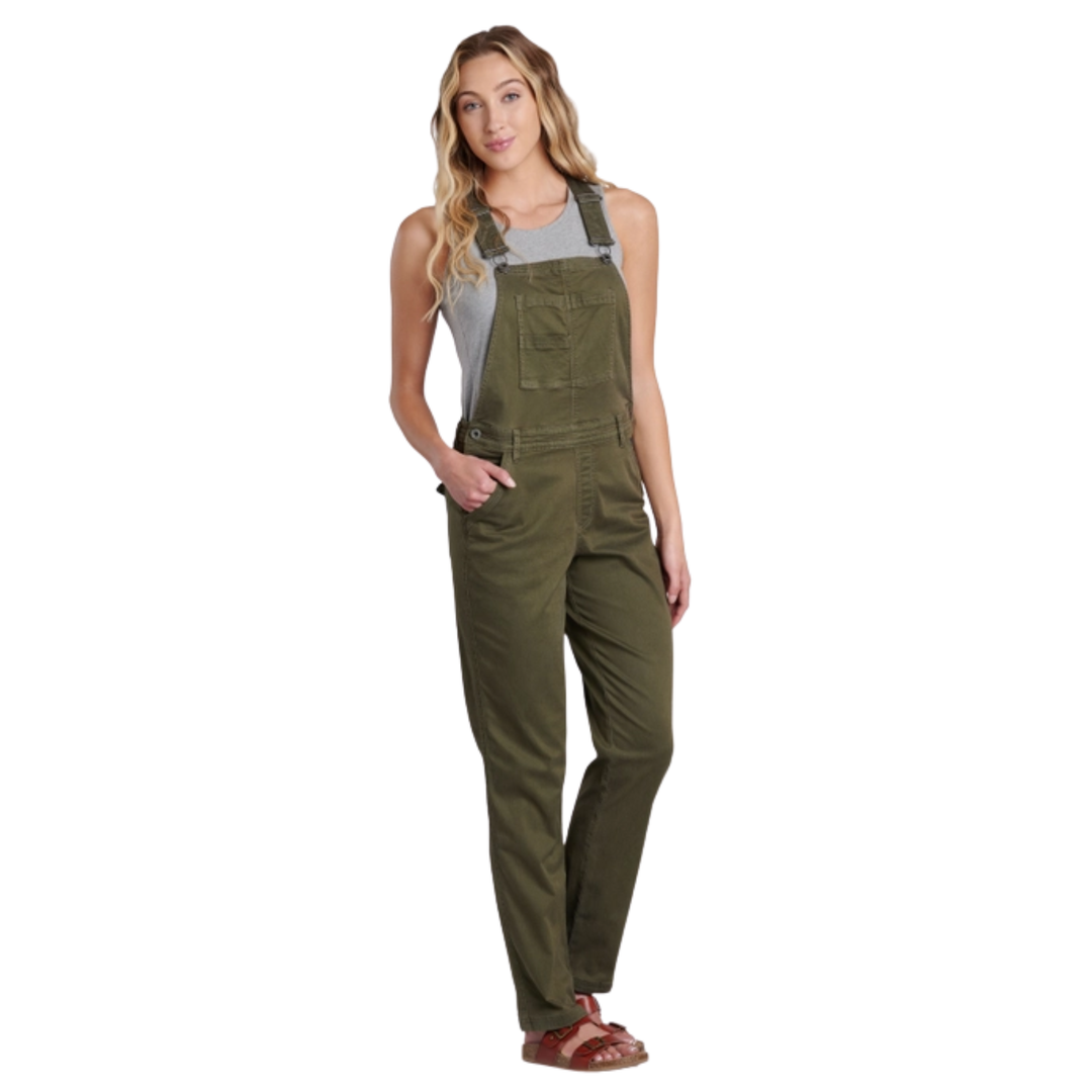 Woman wearing green overalls on a white background