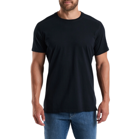 Man wearing a black t-shirt and blue jeans on a white background
