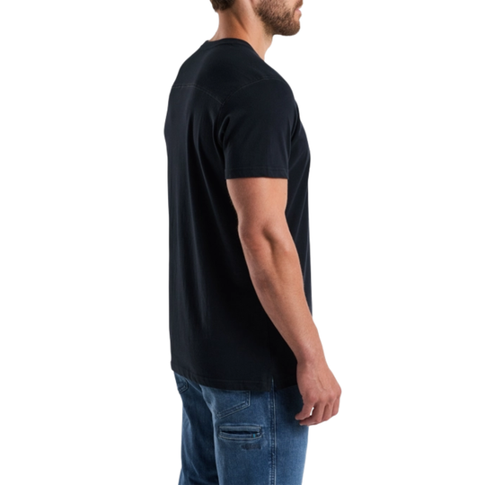Man wearing a black t-shirt and blue jeans on a white background