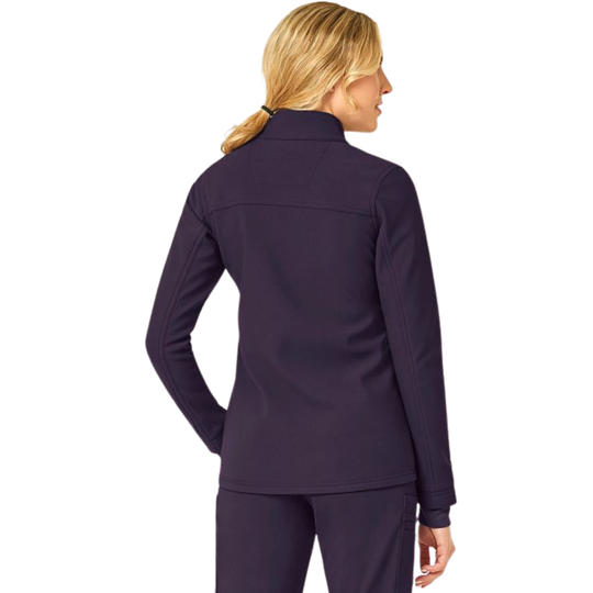 Woman wearing a purple jacket and pants on a white background