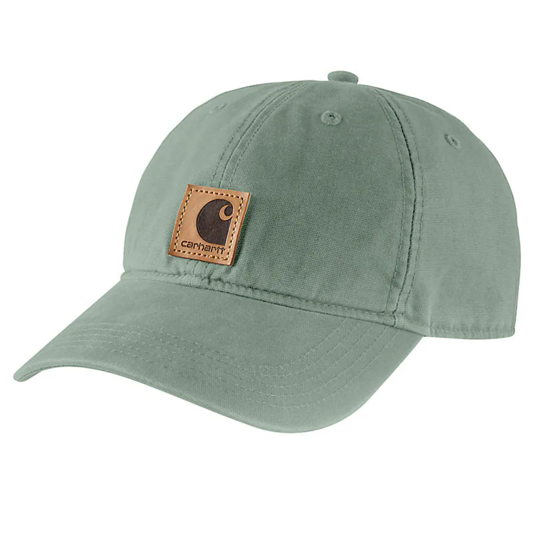 Green cap with a brown leather patch on a white background