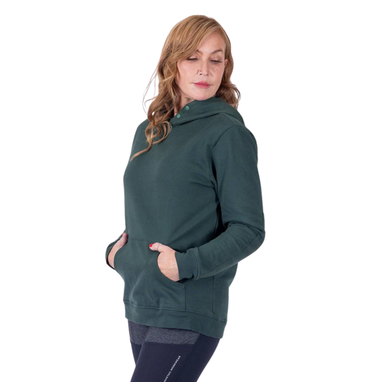 Woman wearing a green hoodie on a white background