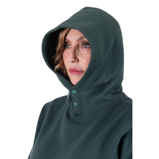 Person wearing a dark green hooded garment on a white background