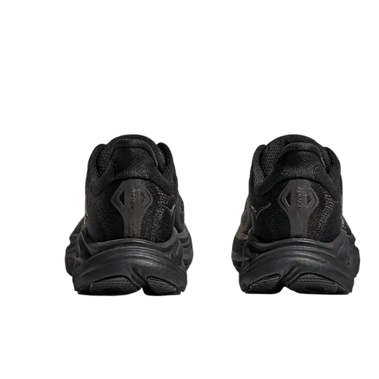 Black athletic shoes shown from the back on a white background