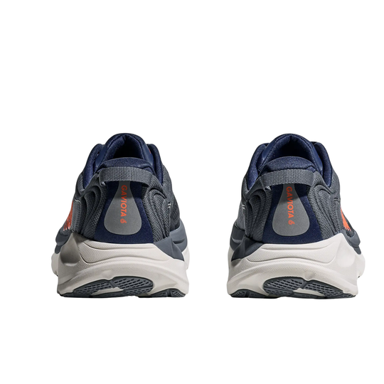 Pair of navy and gray athletic shoes on a white background