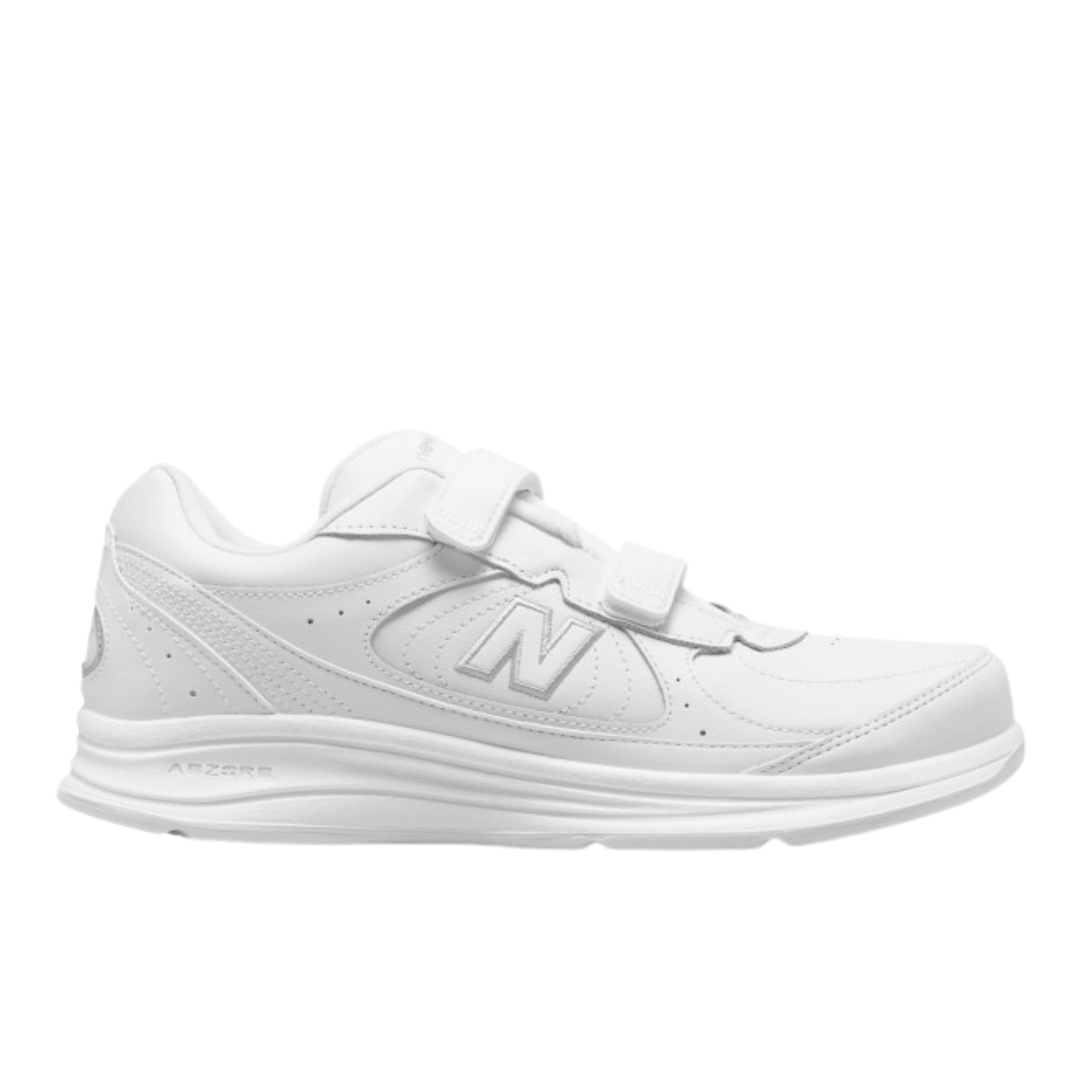 White sneaker with velcro straps on a white background