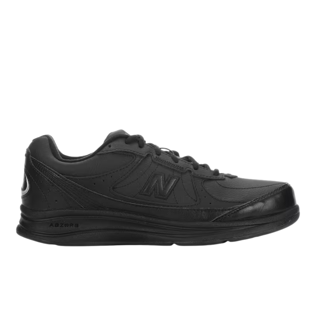 Black lace-up walking sneaker with padded collar and ABZORB text on the sole