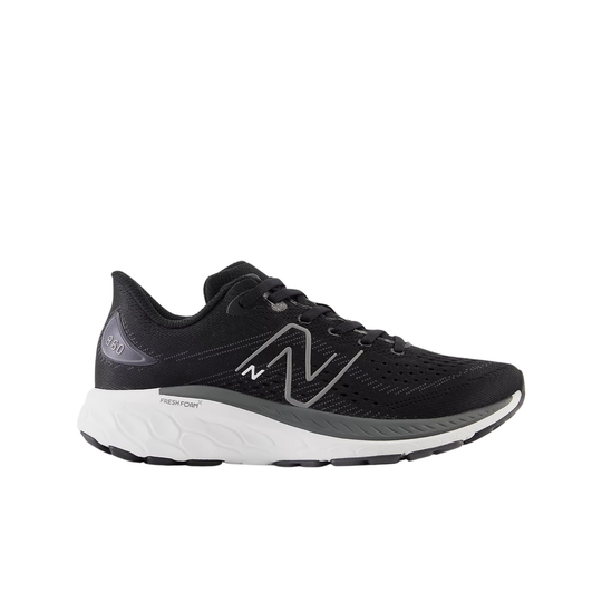 Black running shoe with white sole on a white background