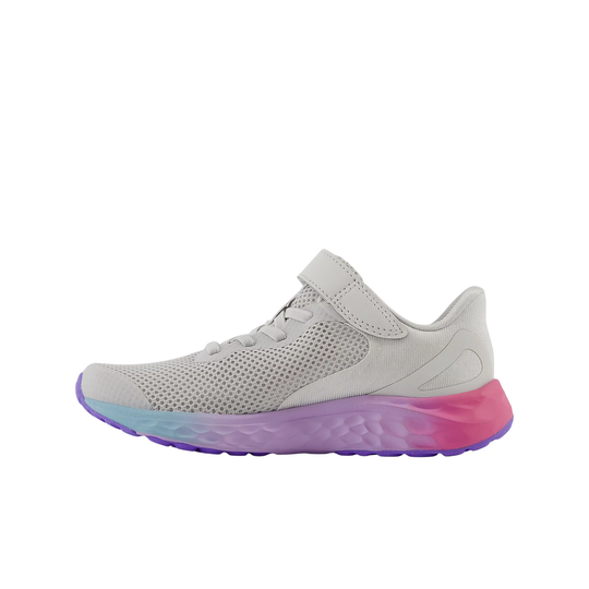 White running shoe with a colorful sole on a white background