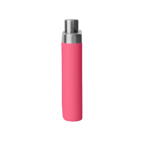 Pink cylindrical object with silver top on a white background