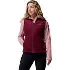 Woman wearing a maroon and pink fleece vest on a white background