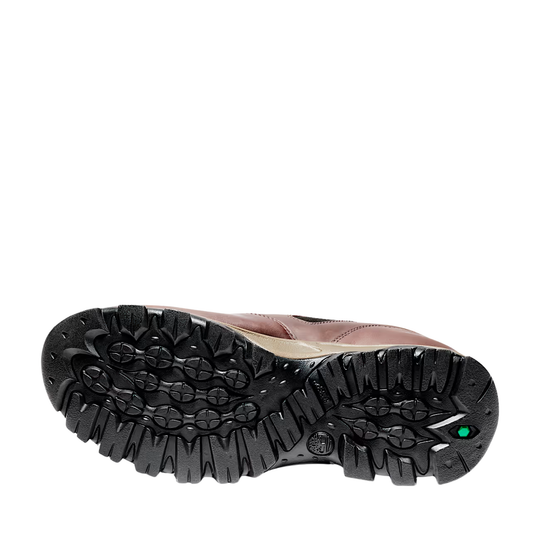 Close-up of a shoe sole with tread pattern on a white background