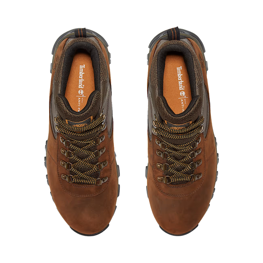 Brown leather hiking boots with black-and-gold laces, top view