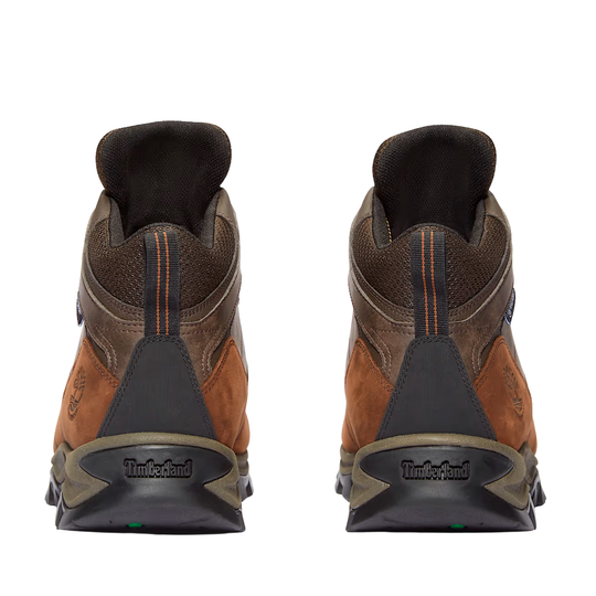 Brown hiking boots shown from the back with black heels and orange stitching