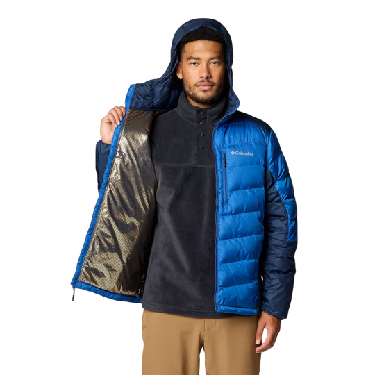 Blue hooded puffer jacket with black sleeves and chest logo, shown open over a black pullover