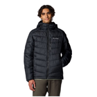 Person wearing a black puffer jacket with Columbia logo on a white background