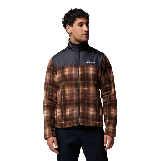 Man wearing a plaid jacket with Columbia logo on a white background