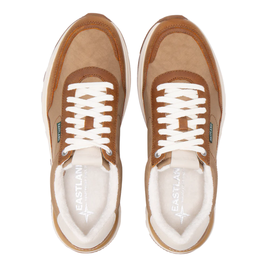 Pair of brown sneakers with white laces and interior on a white background
