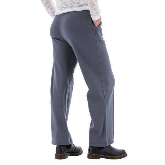 Person wearing gray pants on a white background