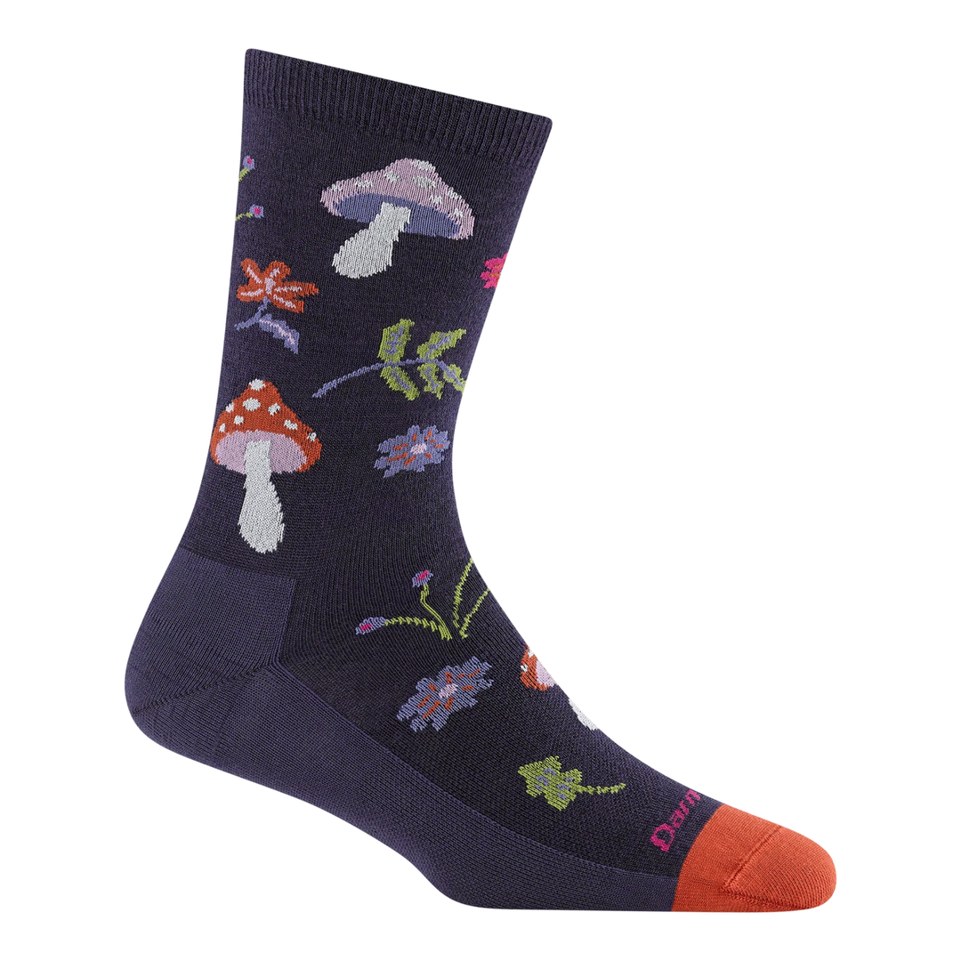 Dark crew sock with mushroom and flower pattern, black toe and heel, and pink visible text near the foot
