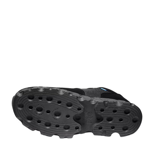 Black sole of a shoe with tread pattern on a white background