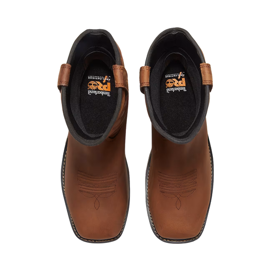 Pair of brown leather boots with visible brand logo on a white background