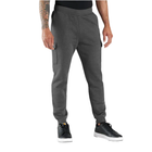 Person wearing gray sweatpants on a white background