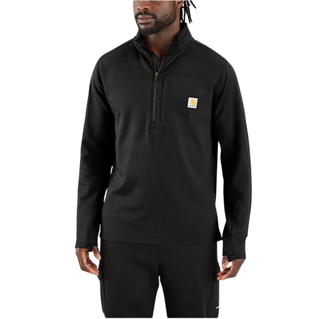 Man wearing a black pullover with a visible brand logo on a white background