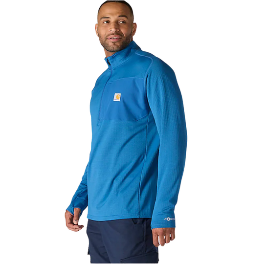 Man wearing a blue jacket with a visible brand logo on a white background