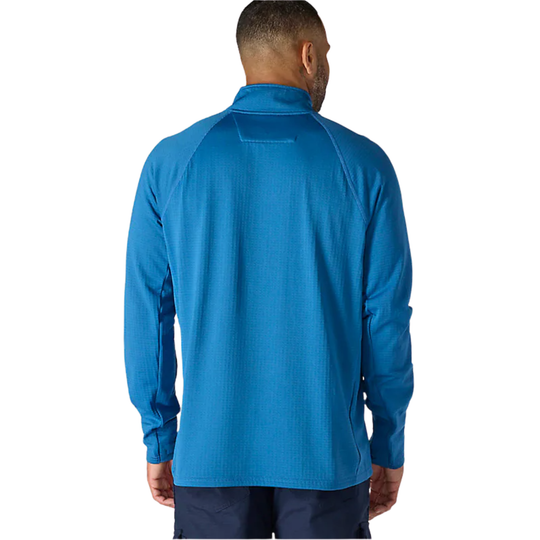 Man wearing a blue long-sleeve shirt on a white background