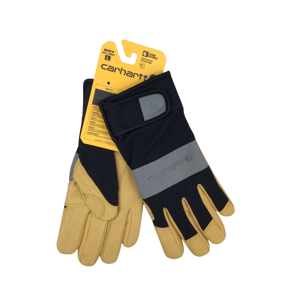 Black and tan work gloves with gray wrist patch and yellow hang tag