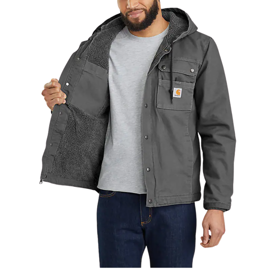 Man wearing a gray jacket with a hood on a white background