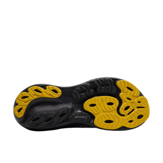 Black and yellow shoe sole with 'Brooks' branding on a white background